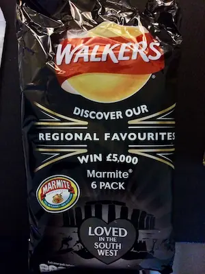 A bag of Walkers Marmite flavored crisps